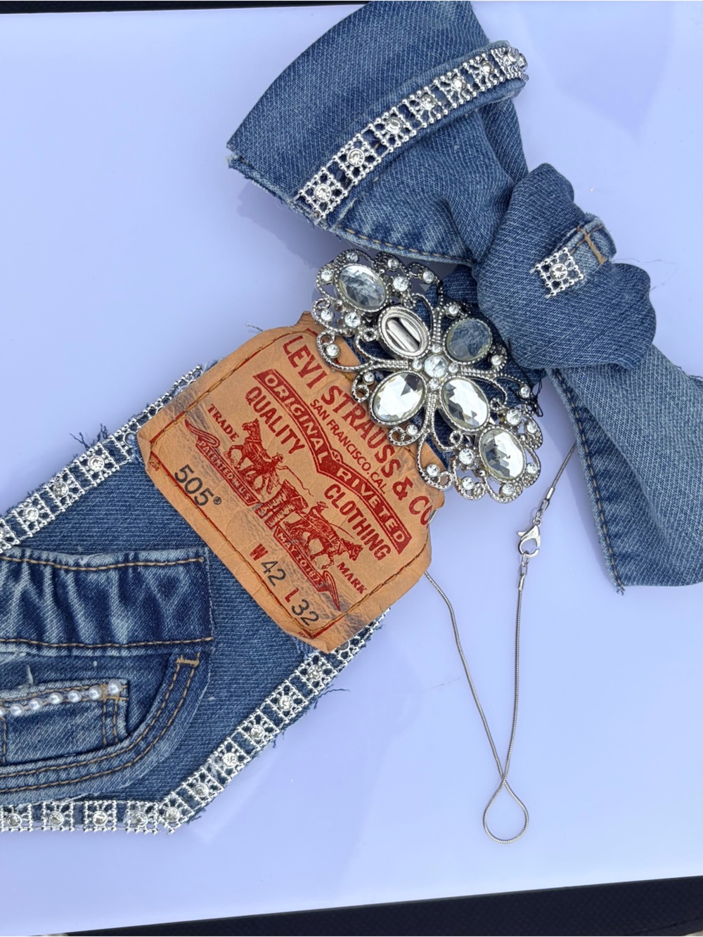 Levi's Blue Denim Jeans with Crystal-Embellished Bow Accent